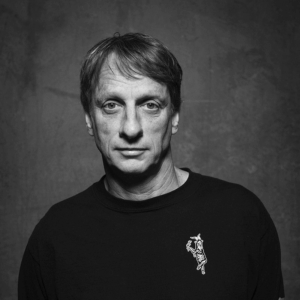 Portrait of Tony Hawk in black and white. Tony is wearing a black long sleeve.
